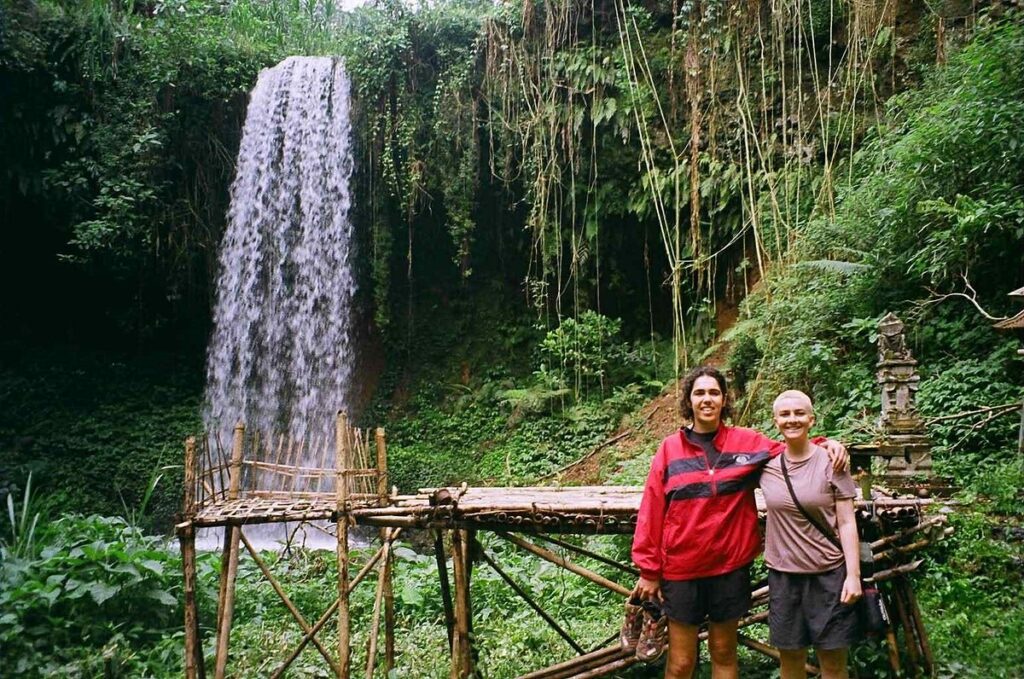 Hikers enjoying the scenic Banyumala Waterfalls Trekking Tour in North Bali.