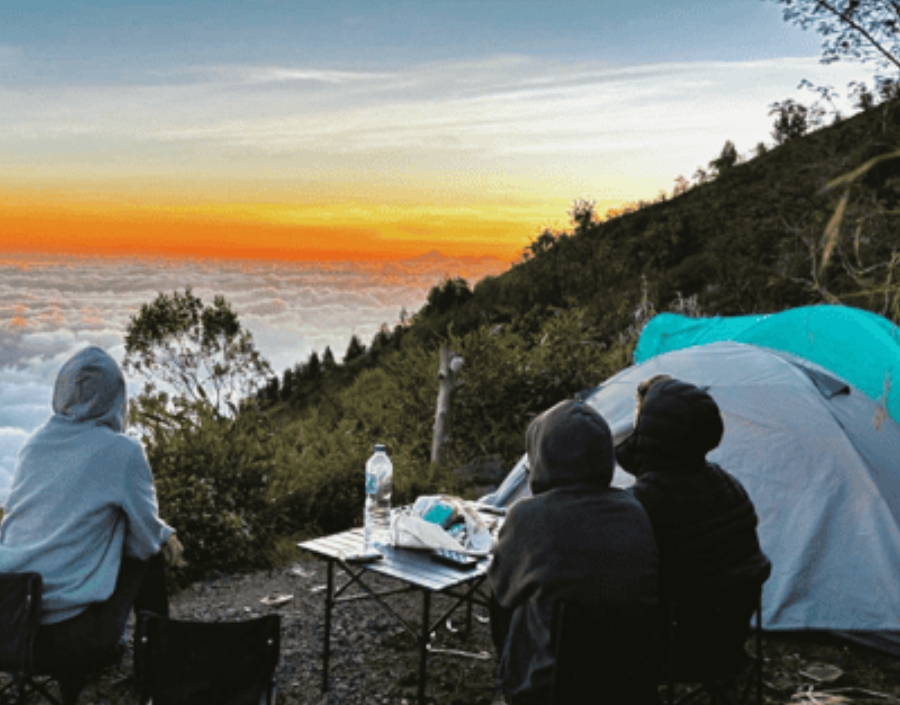 Mount Agung camping experience with a tent overlooking the Bali mountain landscape