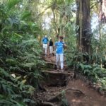 Bali local guide guiding hikers on Mt Sanghyang