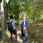 Travelers trekking through traditional Mayong Village in Bali