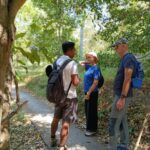 Trekking through tropical plantations and countryside in Mayong Village